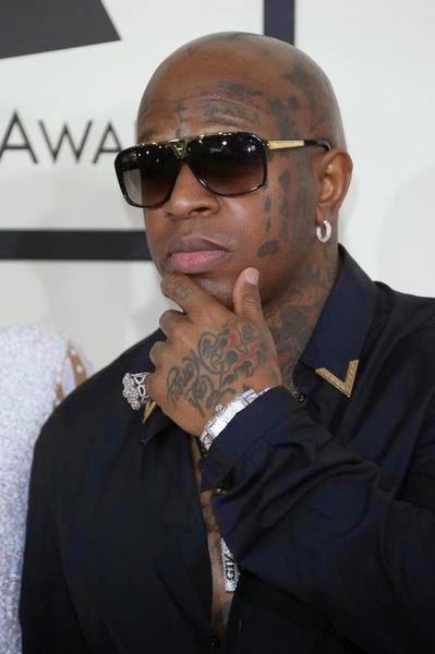 Billionaire CEO with face tattoos