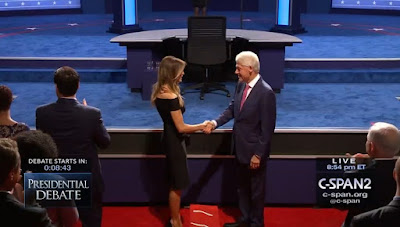 Bill Clinton and Melania Trump handshake